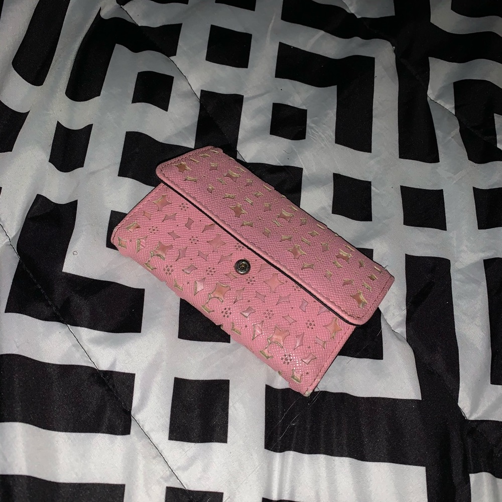 Pink hand-held wallet